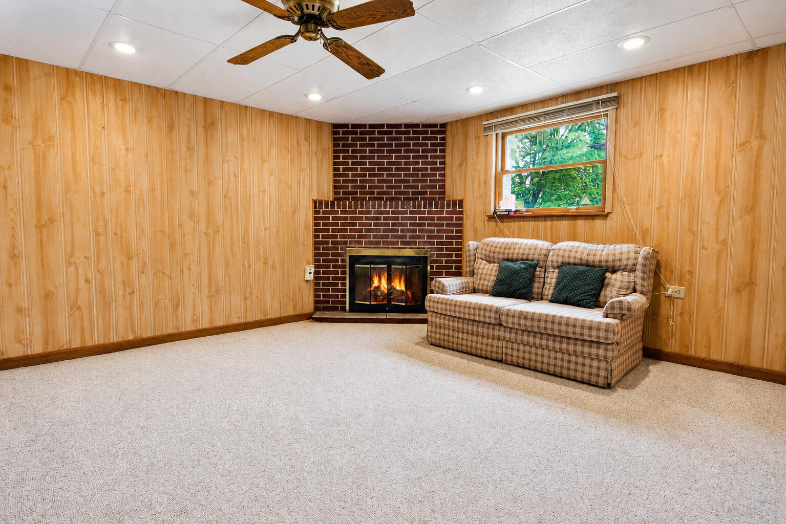 9502 Forrest Drive Highland, IN 46322 - Photo 18 of 27 a living room with furniture and a fireplace
