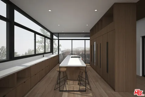 a view of a balcony dining table and chairs