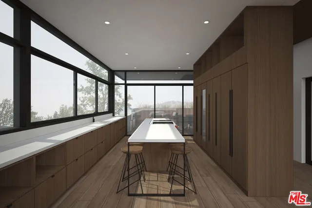 a view of a balcony dining table and chairs