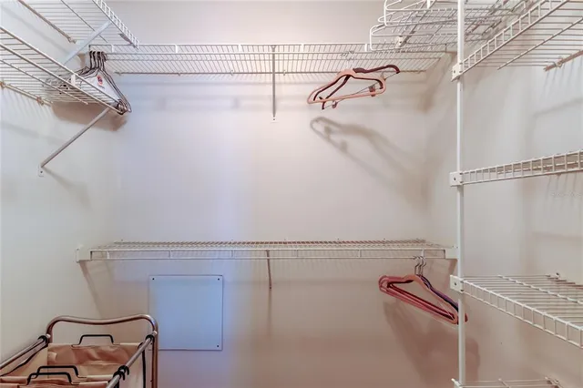 a view of a room with racks on the wall