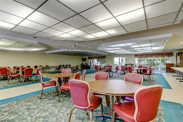 a kitchen with stainless steel appliances granite countertop a sink a stove and cabinets