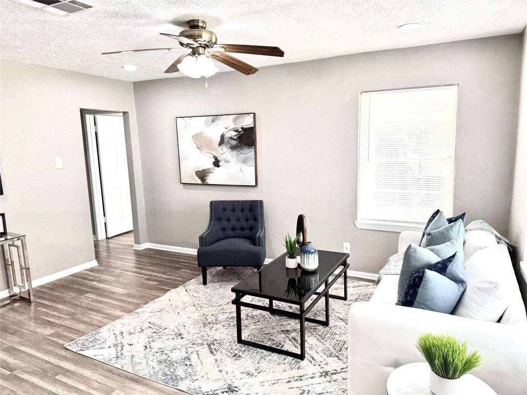 903 Roper Street Houston, TX 77034 - Photo 5 of 18 a living room with furniture and a window