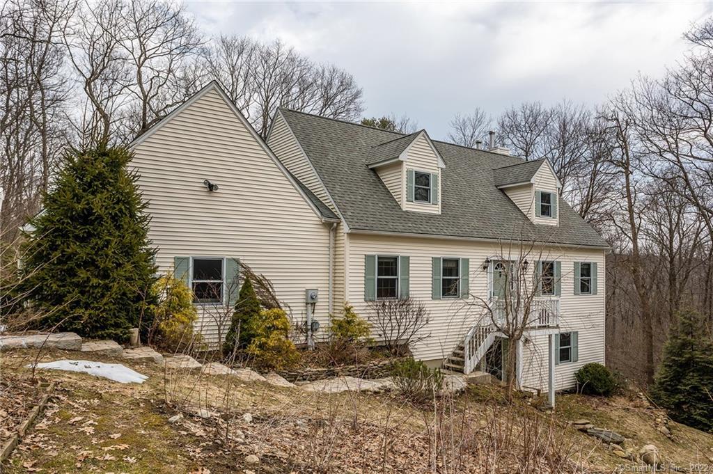 37 Keith Road Warren, CT 06754 - Photo 1 of 1 a view of a white house next to a yard with large trees