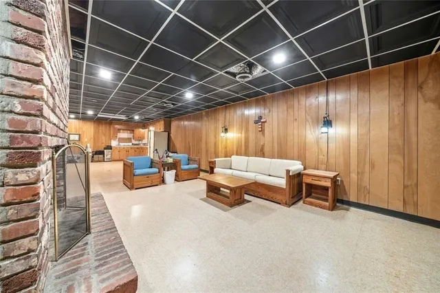 a bedroom with a bed and a mirror