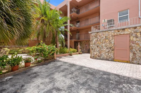 a view of a street with a building