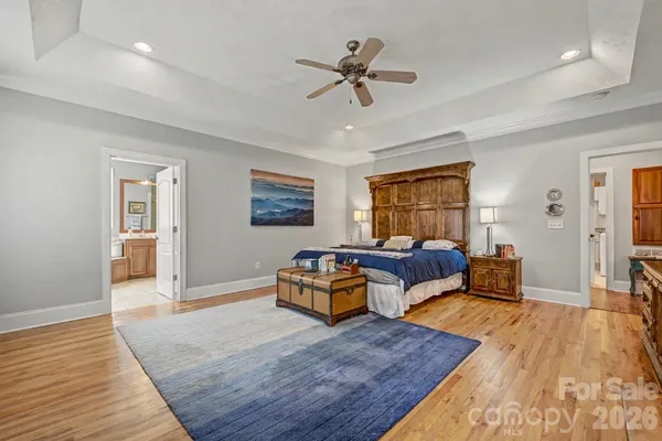a bedroom with furniture and window