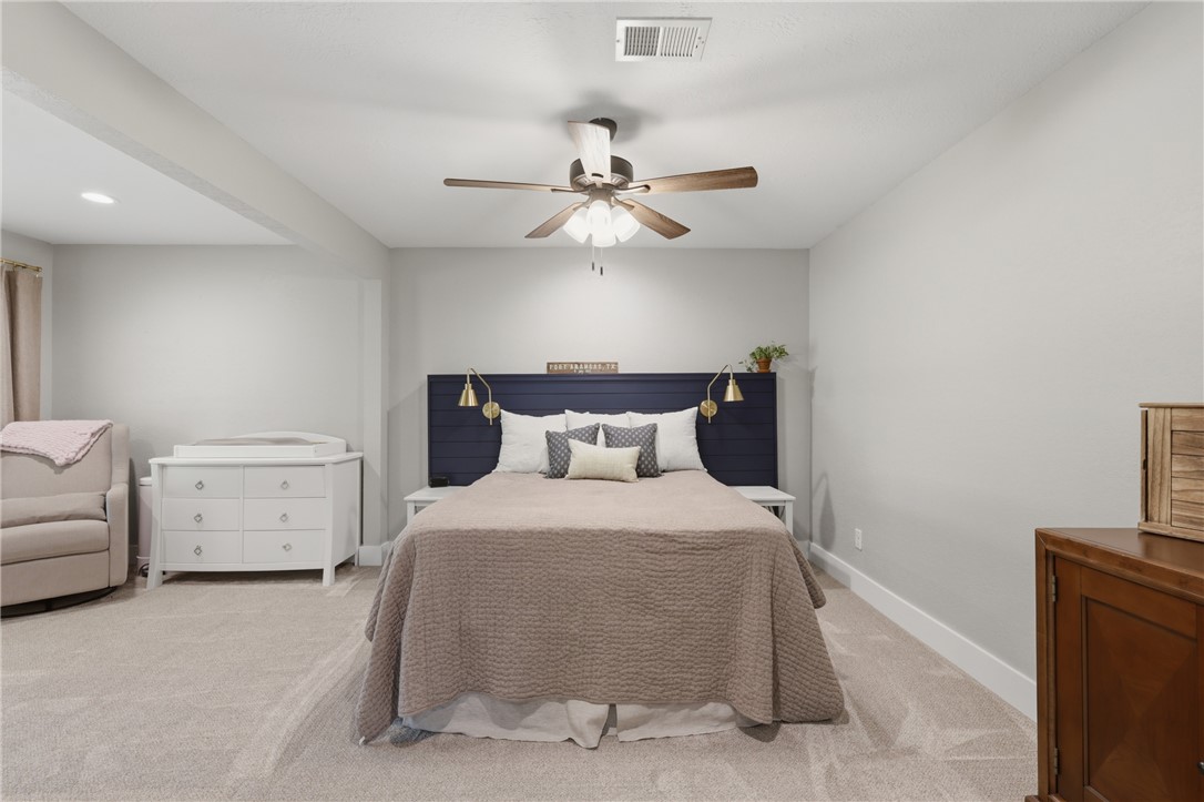 515 Crescent Drive Bryan, TX 77801 - Photo 18 of 43 Spacious room featuring neutral paint tones and wall-to-wall carpeting
