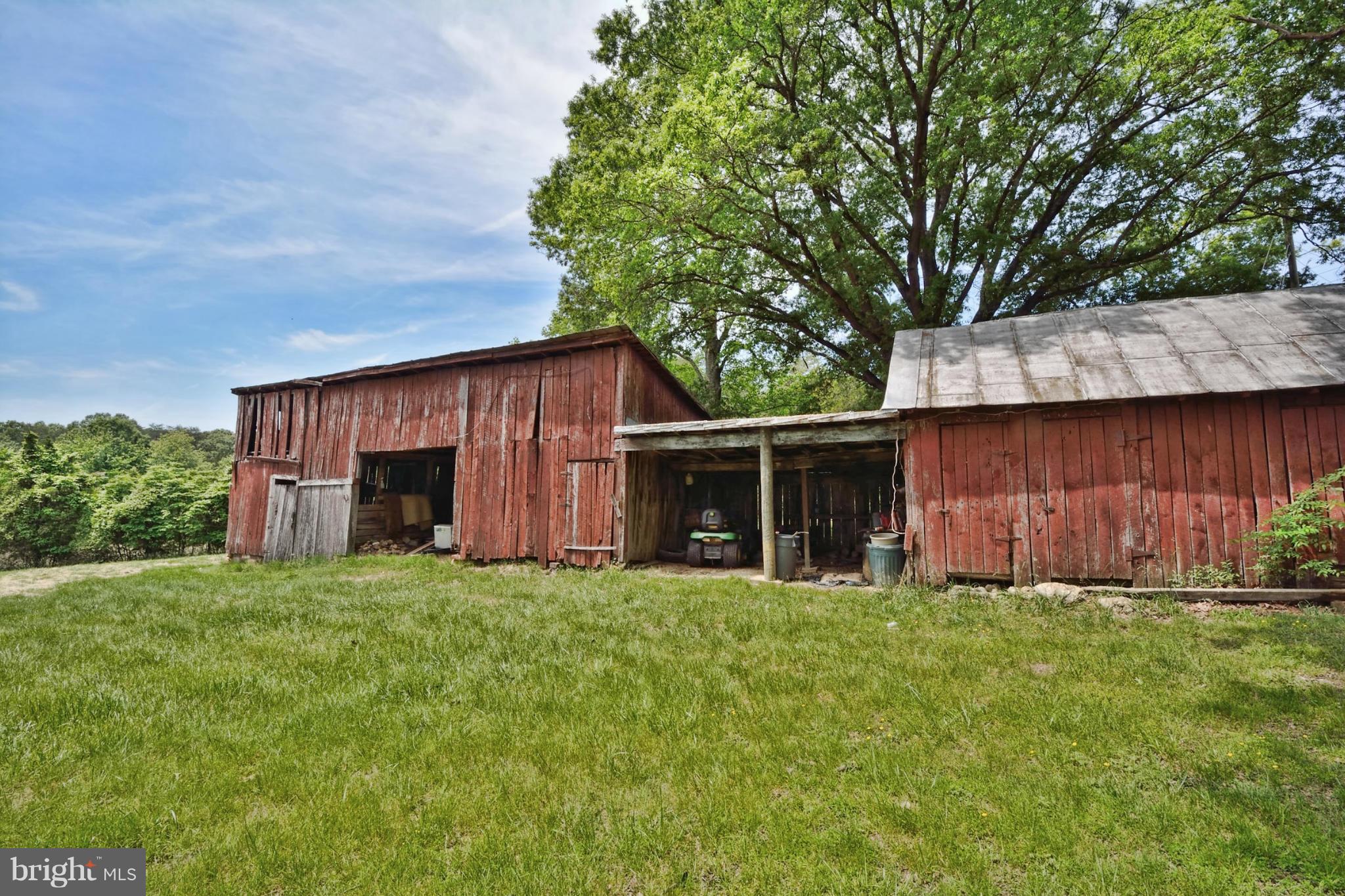 4479 Courtneys Corner Road Sumerduck, VA 22742 - Photo 27 of 30 a house with a tree in front of it