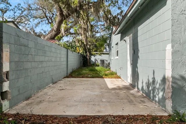 a view of an empty room with a large window