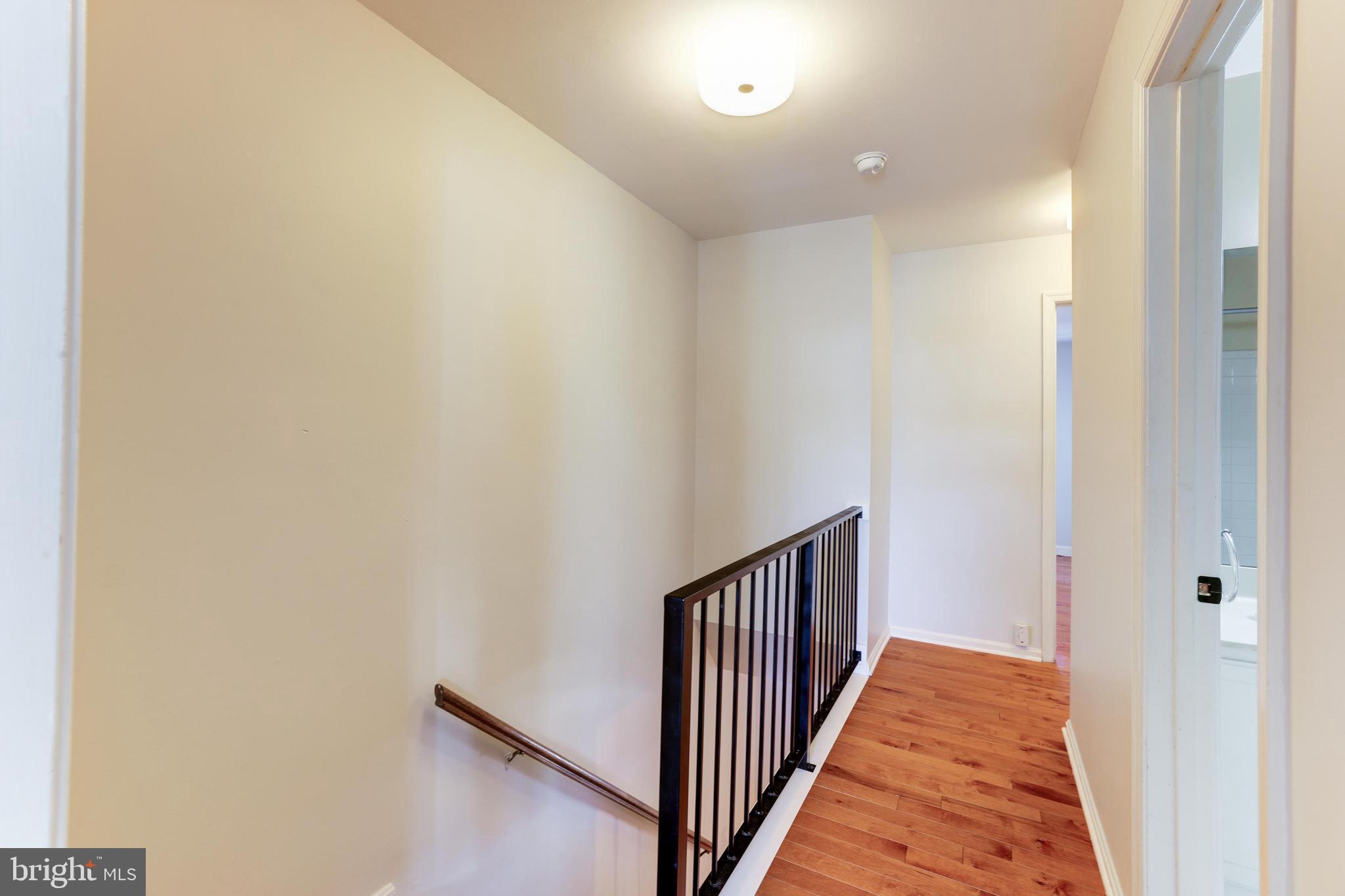 9053 Ottawa Place Silver Spring, MD 20910 - Photo 21 of 65 Upstairs hallway with new hardwood floors