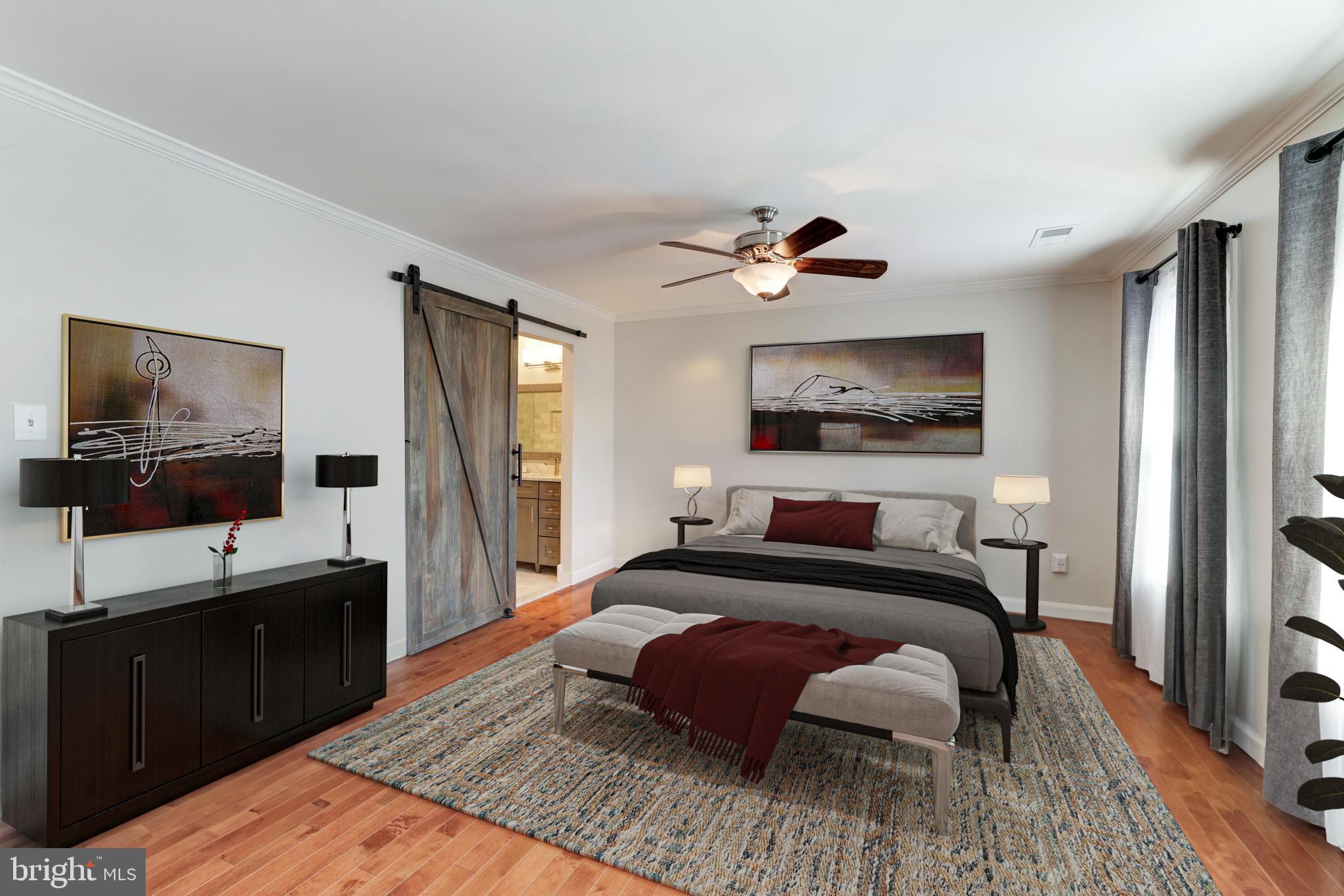 9053 Ottawa Place Silver Spring, MD 20910 - Photo 22 of 65 Primary BR w/ new barn door that leads to bathroom