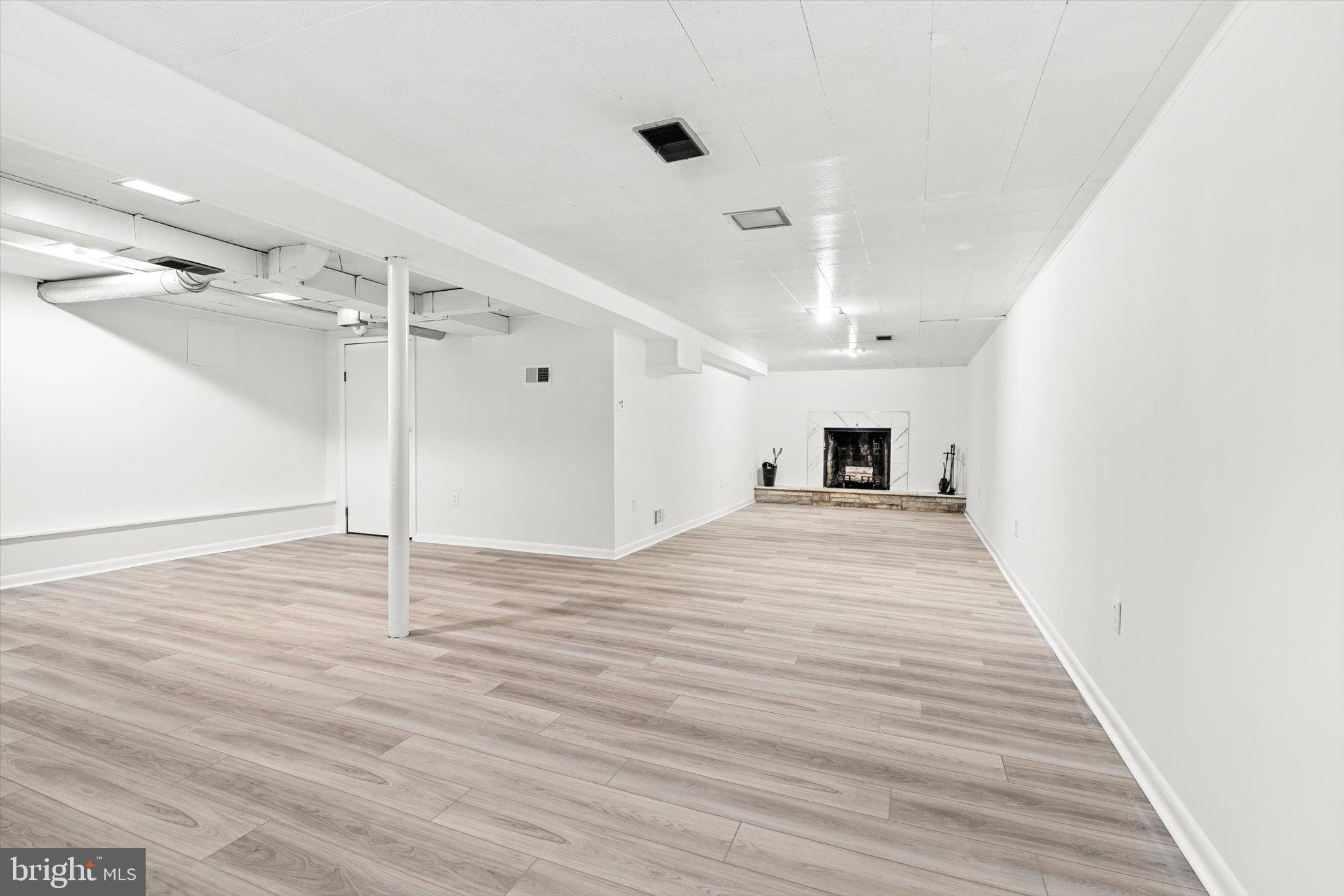 10 Whitman Road Hamilton, NJ 08619 - Photo 19 of 28 a view of a room with wooden floor