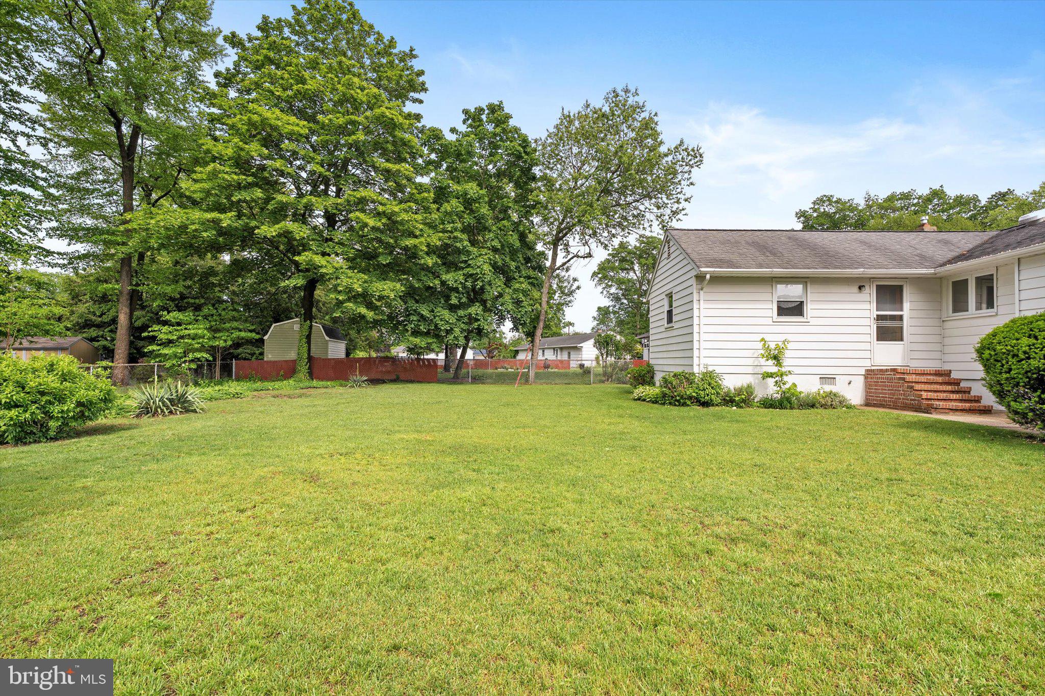 10 Whitman Road Hamilton, NJ 08619 - Photo 25 of 28 a front view of house with yard and trees