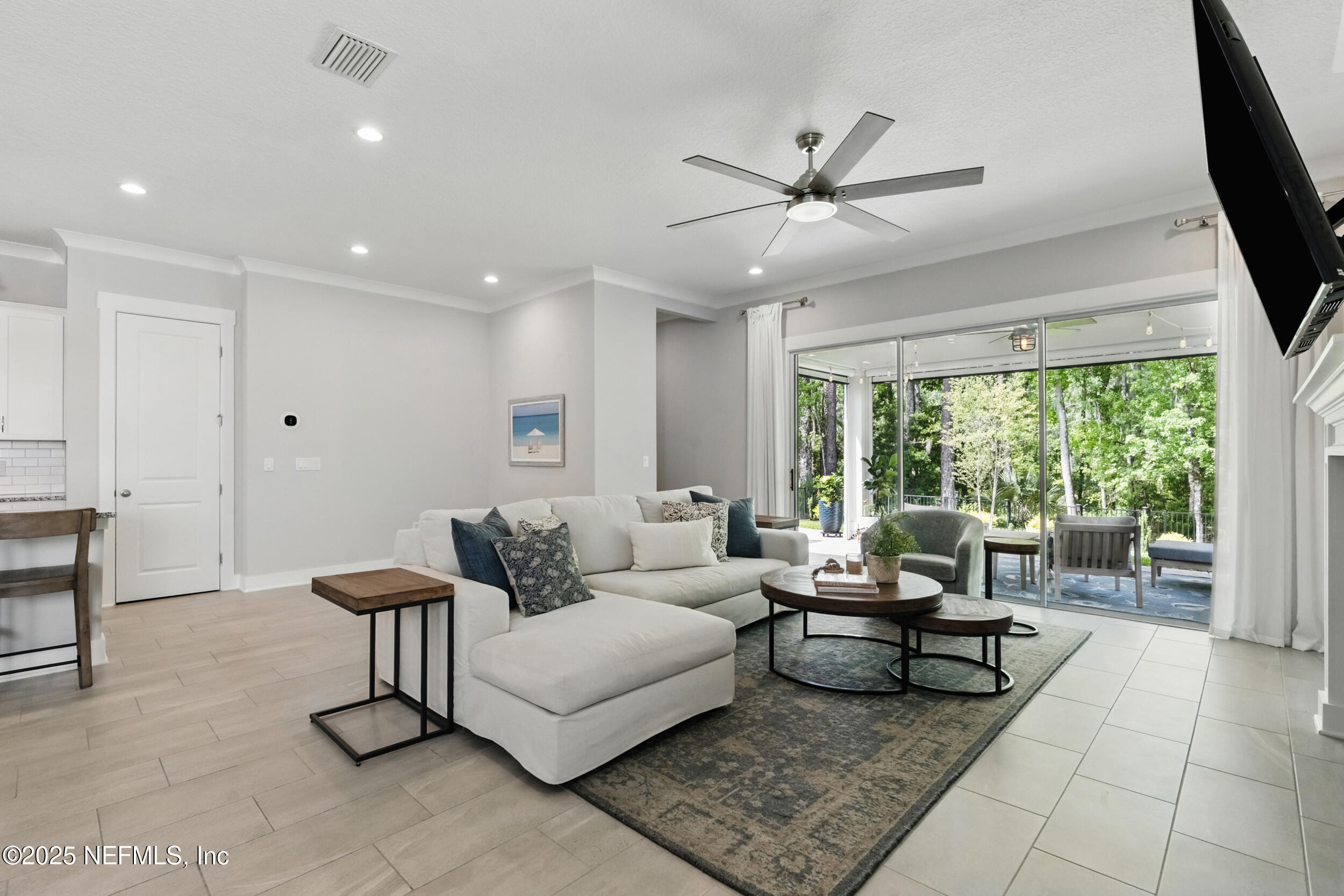 9918 Filament Boulevard Jacksonville, FL 32256 - Photo 18 of 106 a living room with furniture and a large window
