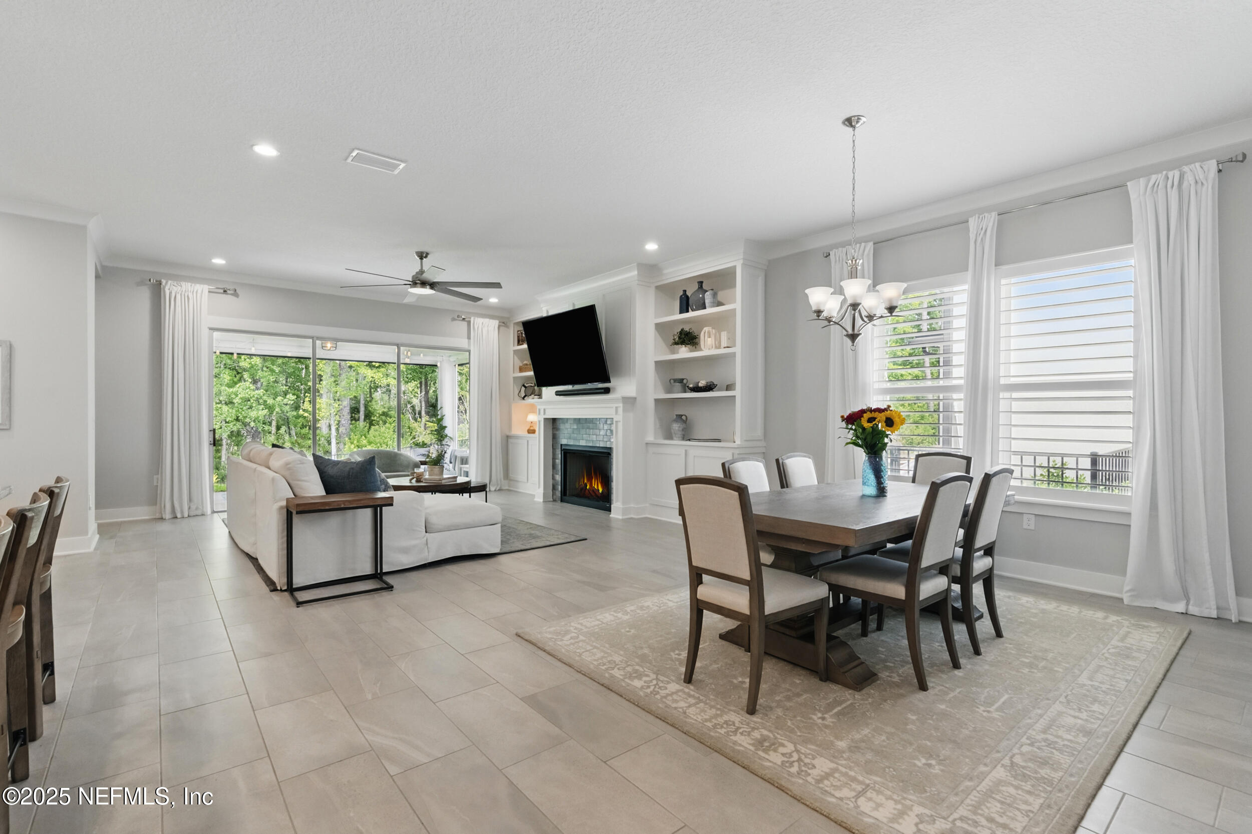 9918 Filament Boulevard Jacksonville, FL 32256 - Photo 24 of 106 a dining room with furniture and window