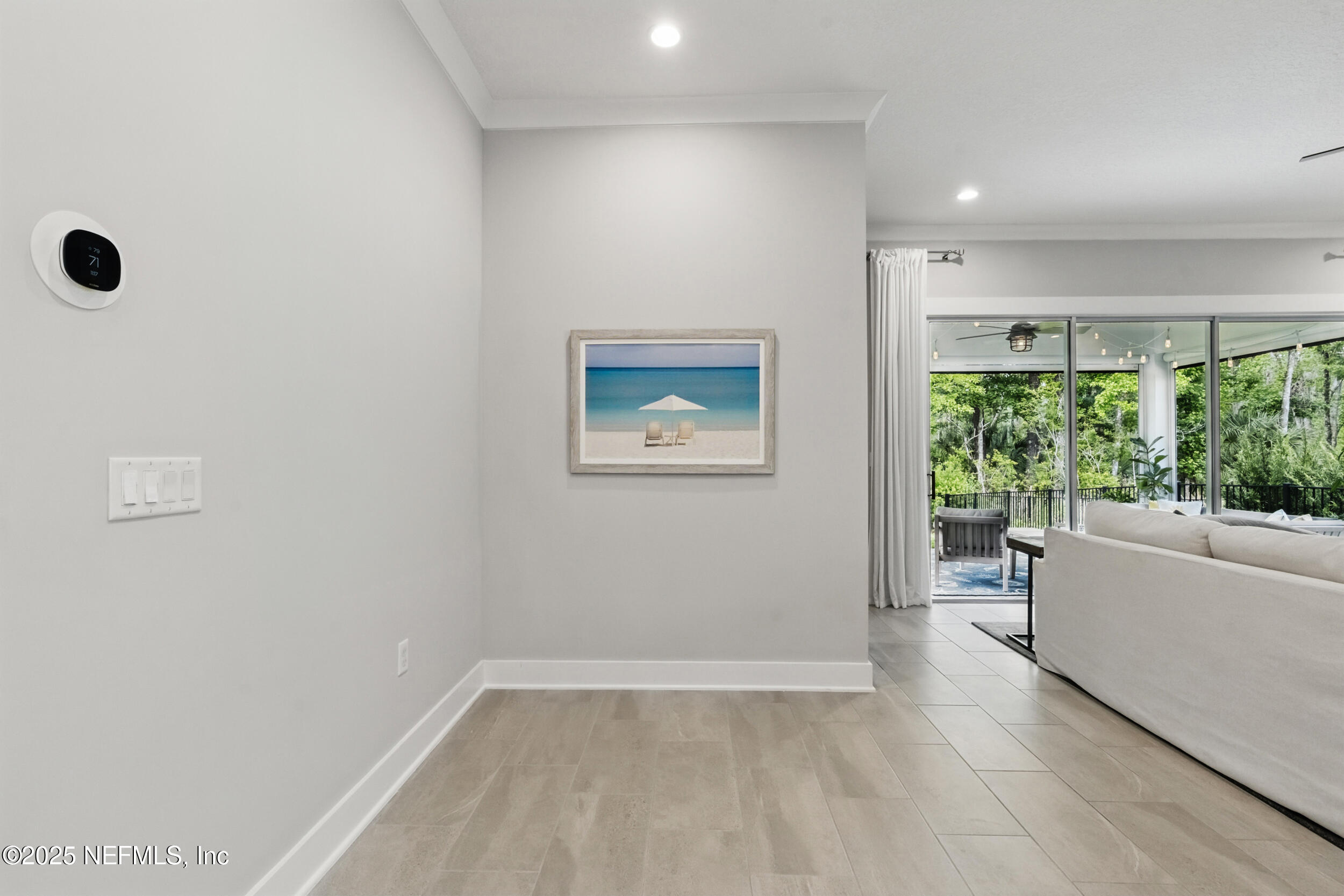 9918 Filament Boulevard Jacksonville, FL 32256 - Photo 26 of 106 an empty room with a window