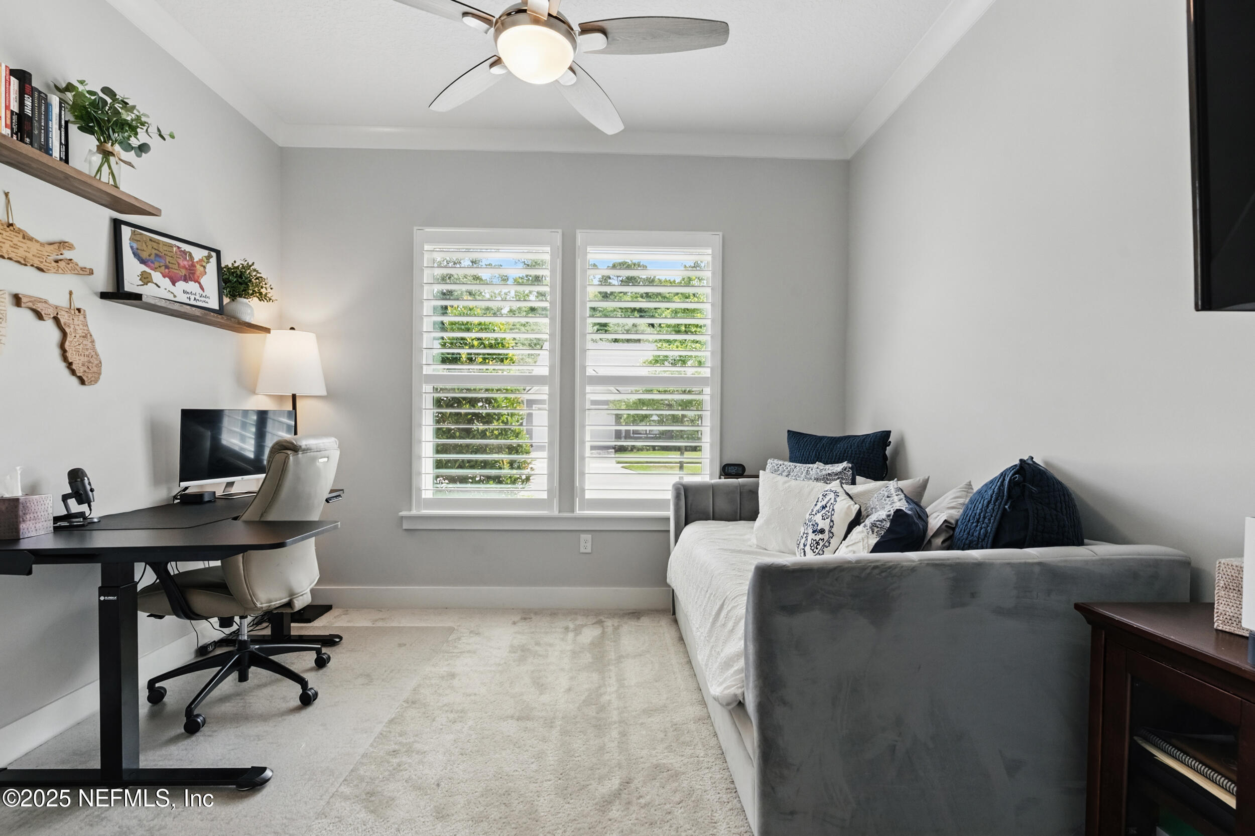 9918 Filament Boulevard Jacksonville, FL 32256 - Photo 38 of 106 a living room with furniture and a window