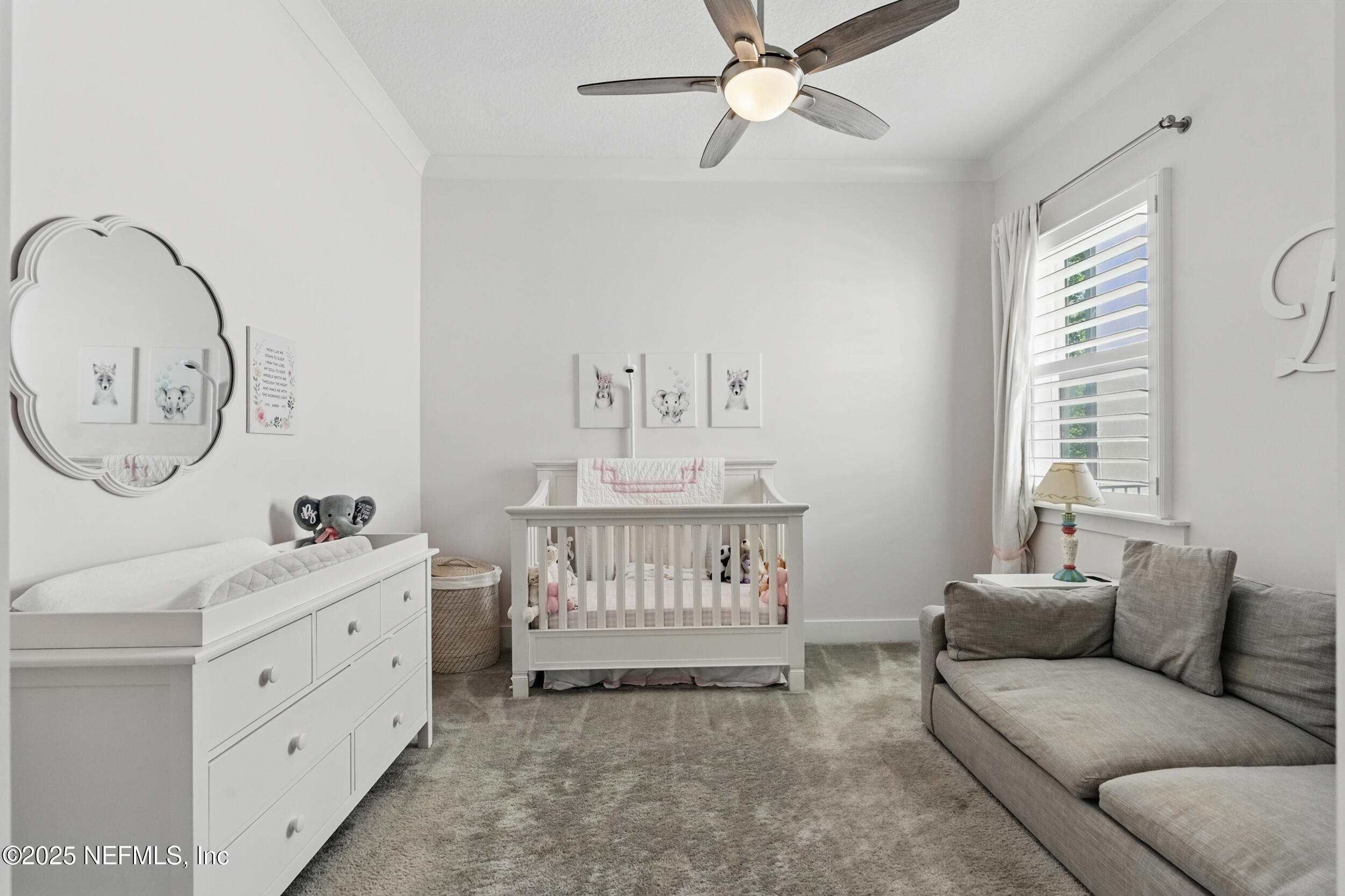 9918 Filament Boulevard Jacksonville, FL 32256 - Photo 42 of 106 a living room with furniture and a window