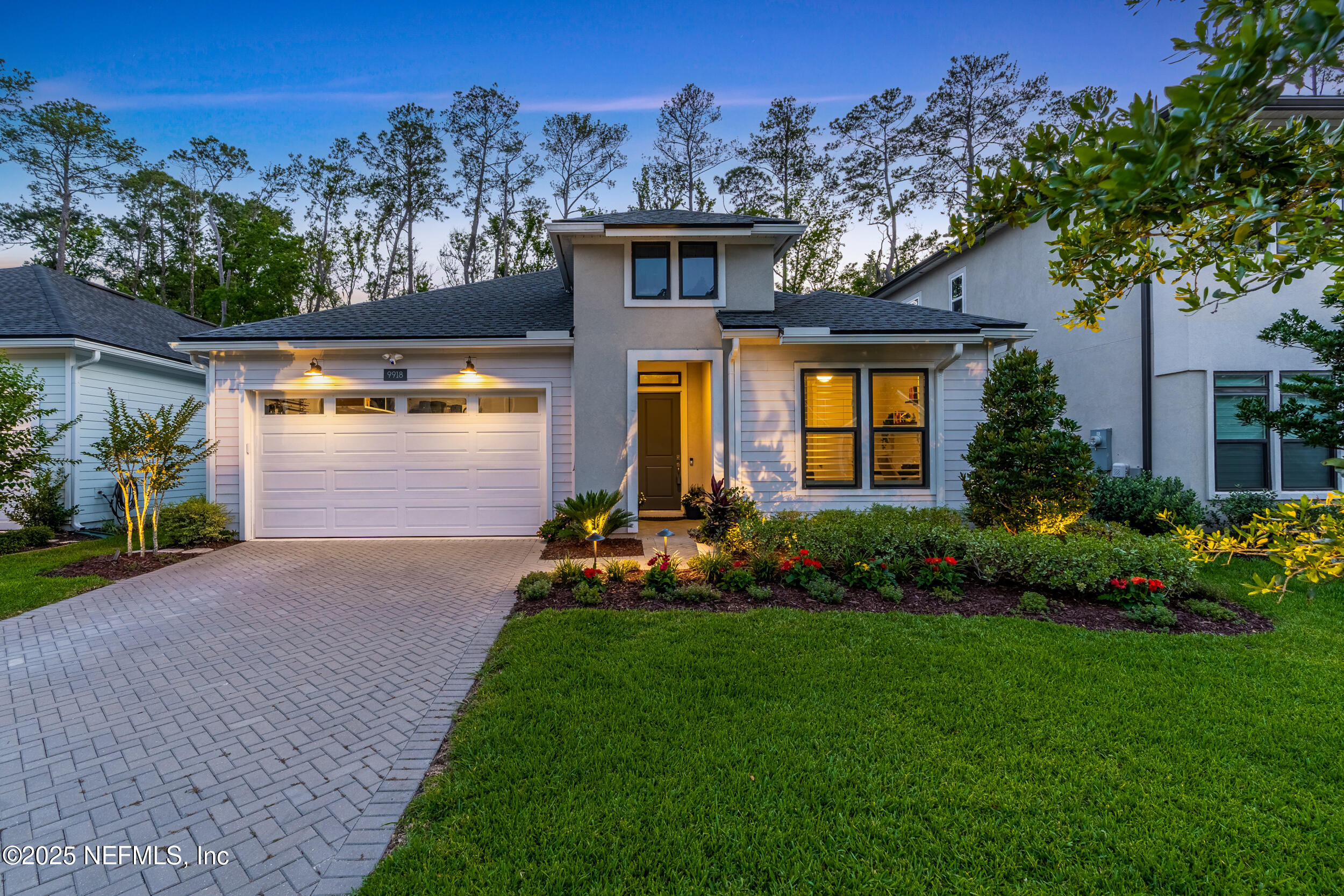 9918 Filament Boulevard Jacksonville, FL 32256 - Photo 68 of 106 a front view of house with yard and green space