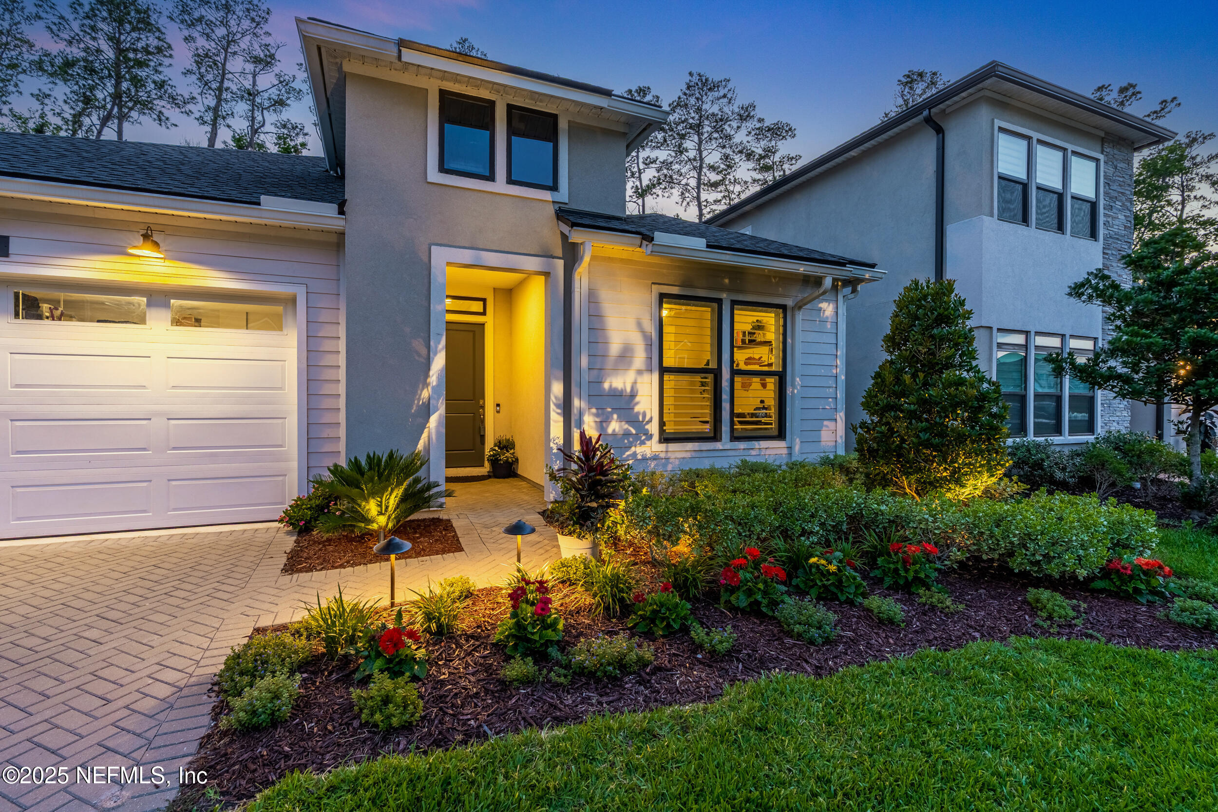 9918 Filament Boulevard Jacksonville, FL 32256 - Photo 72 of 106 a front view of a house having yard