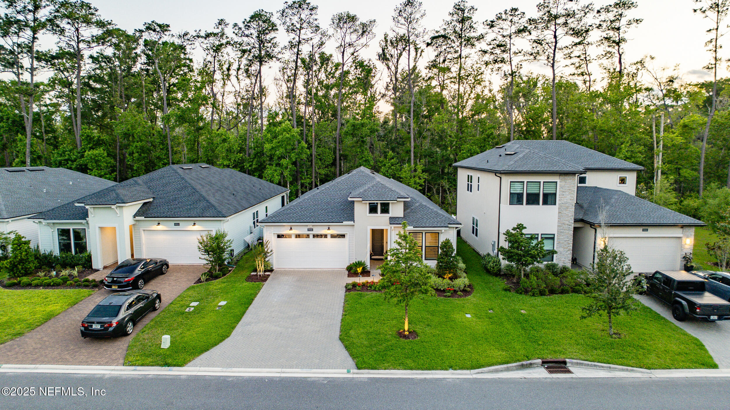 9918 Filament Boulevard Jacksonville, FL 32256 - Photo 73 of 106 a front view of a house with a yard