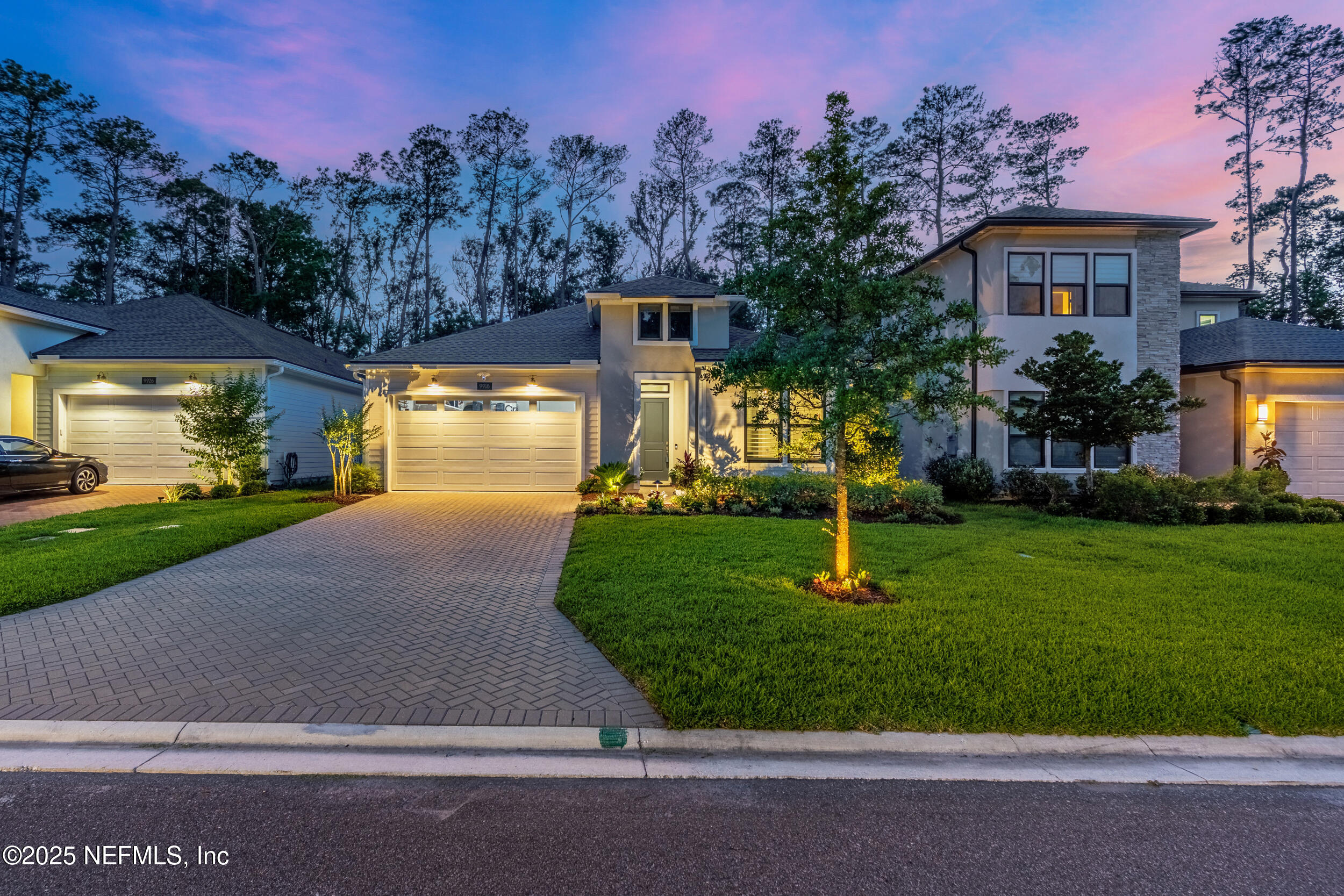 9918 Filament Boulevard Jacksonville, FL 32256 - Photo 74 of 106 a garden with trees in the background