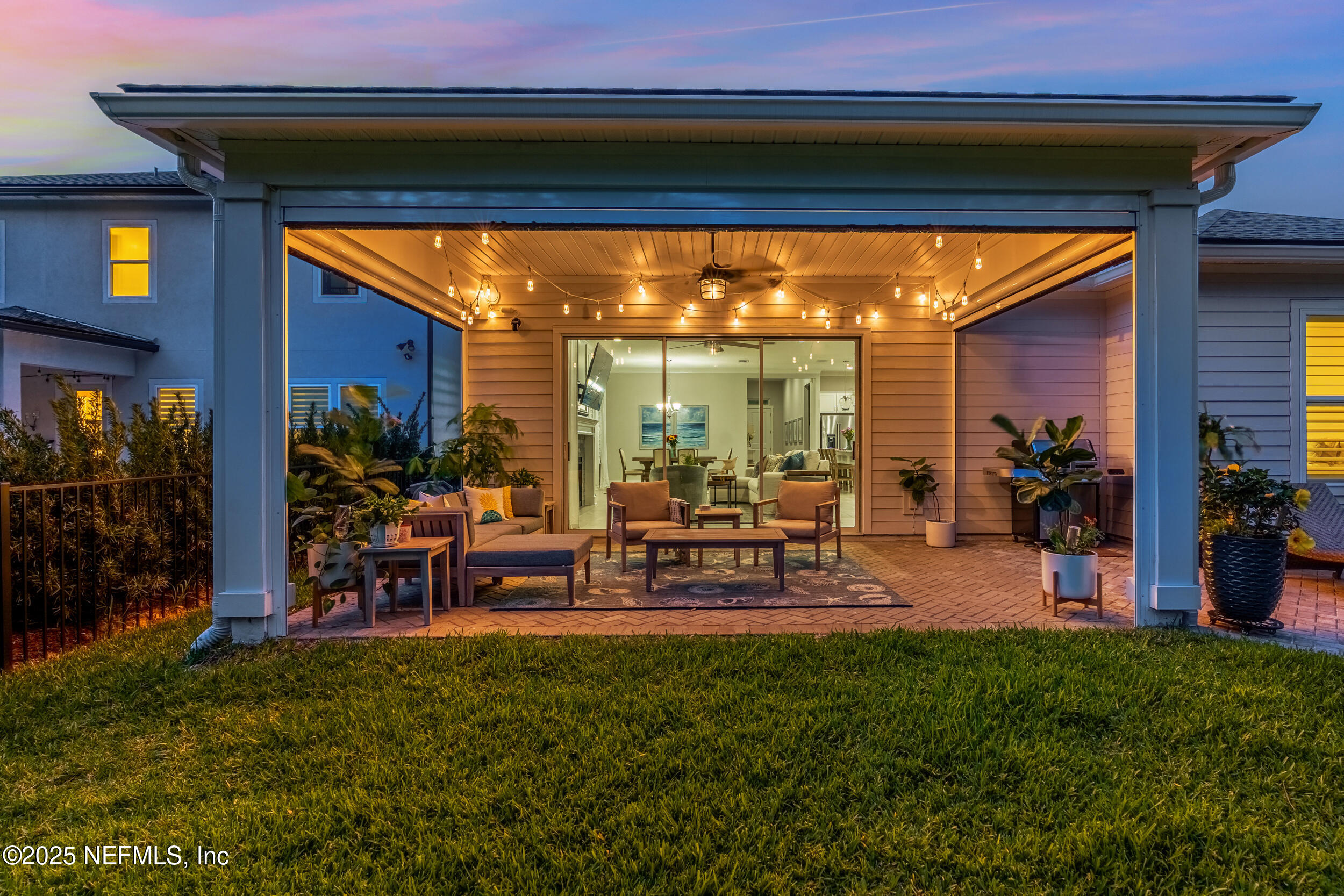 9918 Filament Boulevard Jacksonville, FL 32256 - Photo 76 of 106 a view of a chairs and table in a patio