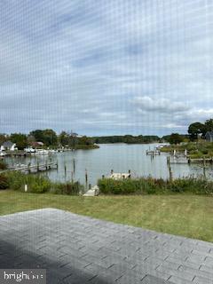 6343 Bozman Neavitt Road Neavitt, MD 21652 - Photo 21 of 23 a view of a lake with houses in the back