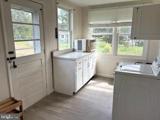 6343 Bozman Neavitt Road Neavitt, MD 21652 - Photo 8 of 23 a view of utility room with washer and dryer