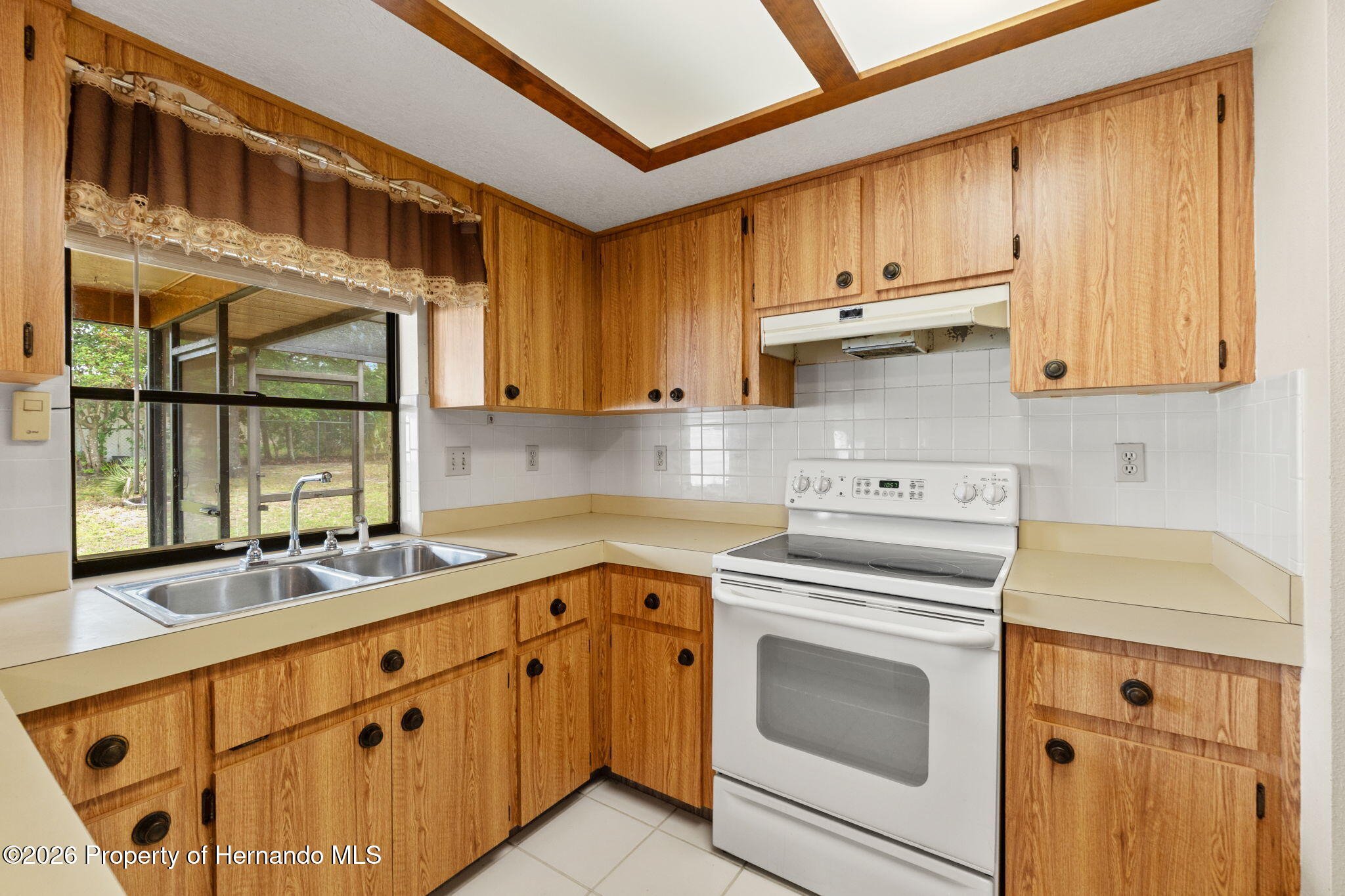 11312 Sedgefield Avenue Spring Hill, FL 34608 - Photo 13 of 28 kitchen