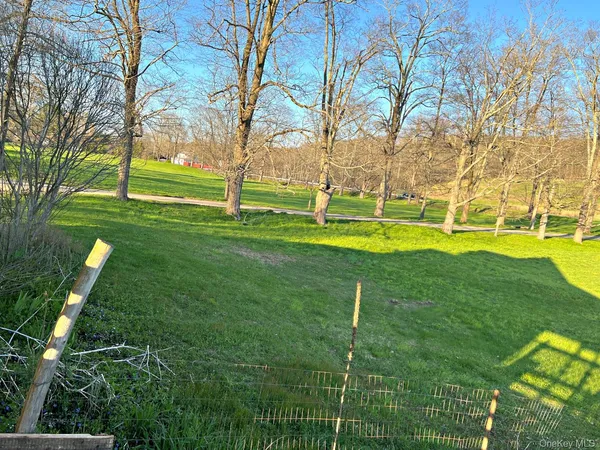 a view of a house with a big yard