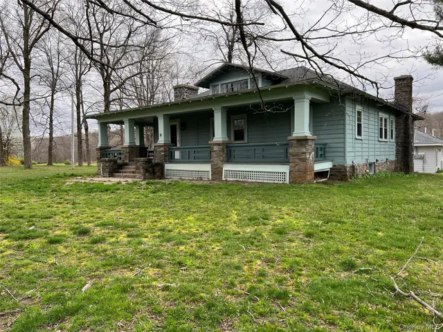 a house with garden in front of it