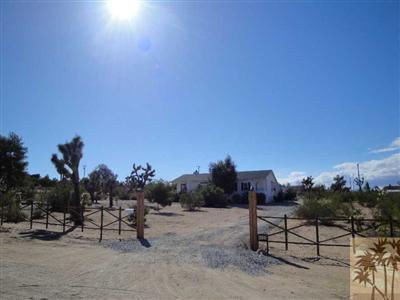 6620 Outpost Road Joshua Tree, CA 92252 - Photo 1 of 24 a view of a terrace with sitting area