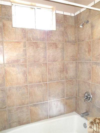 6620 Outpost Road Joshua Tree, CA 92252 - Photo 16 of 24 a bathroom with a bathtub