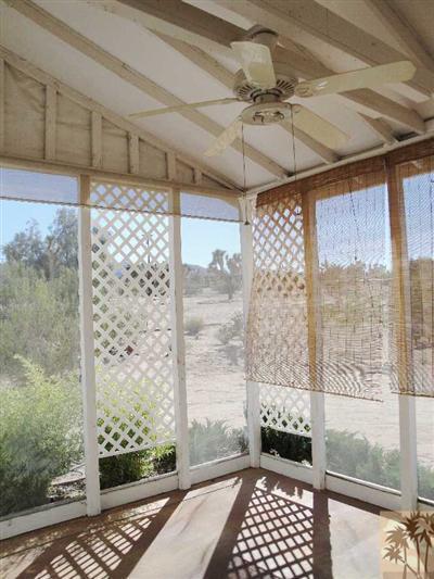 6620 Outpost Road Joshua Tree, CA 92252 - Photo 17 of 24 a view of a room with a large window