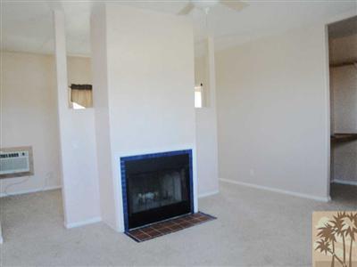 6620 Outpost Road Joshua Tree, CA 92252 - Photo 10 of 24 a room with a fireplace