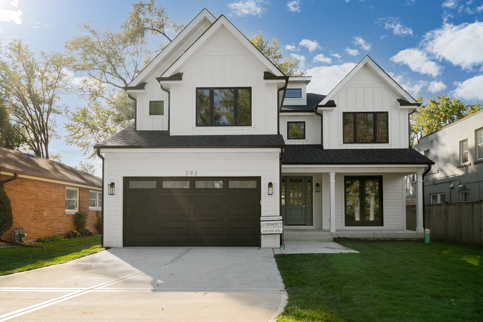 315 Walnut Street Elmhurst, IL 60126 - Photo 1 of 39 a front view of a house with a garden and yard
