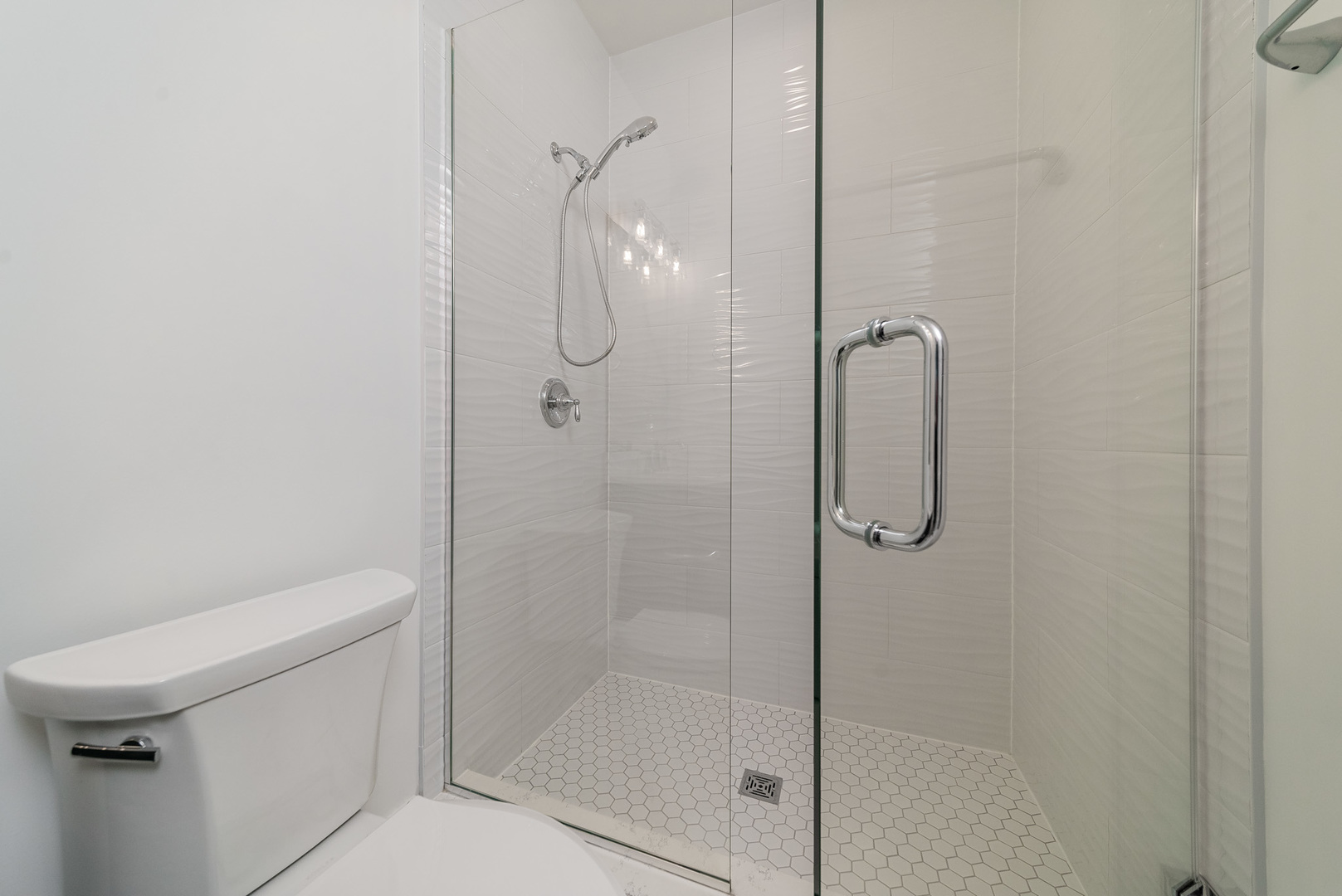 315 Walnut Street Elmhurst, IL 60126 - Photo 11 of 39 a bathroom with a shower and toilet