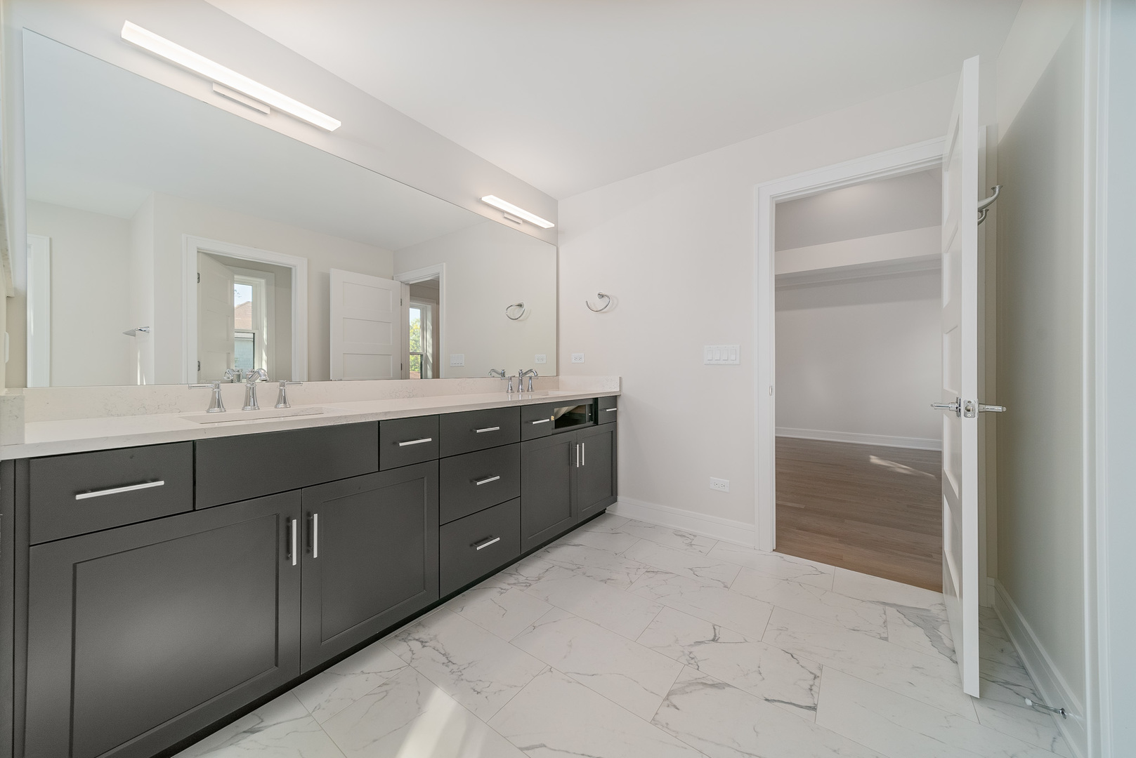 315 Walnut Street Elmhurst, IL 60126 - Photo 26 of 39 a bathroom with a double vanity sink and mirror