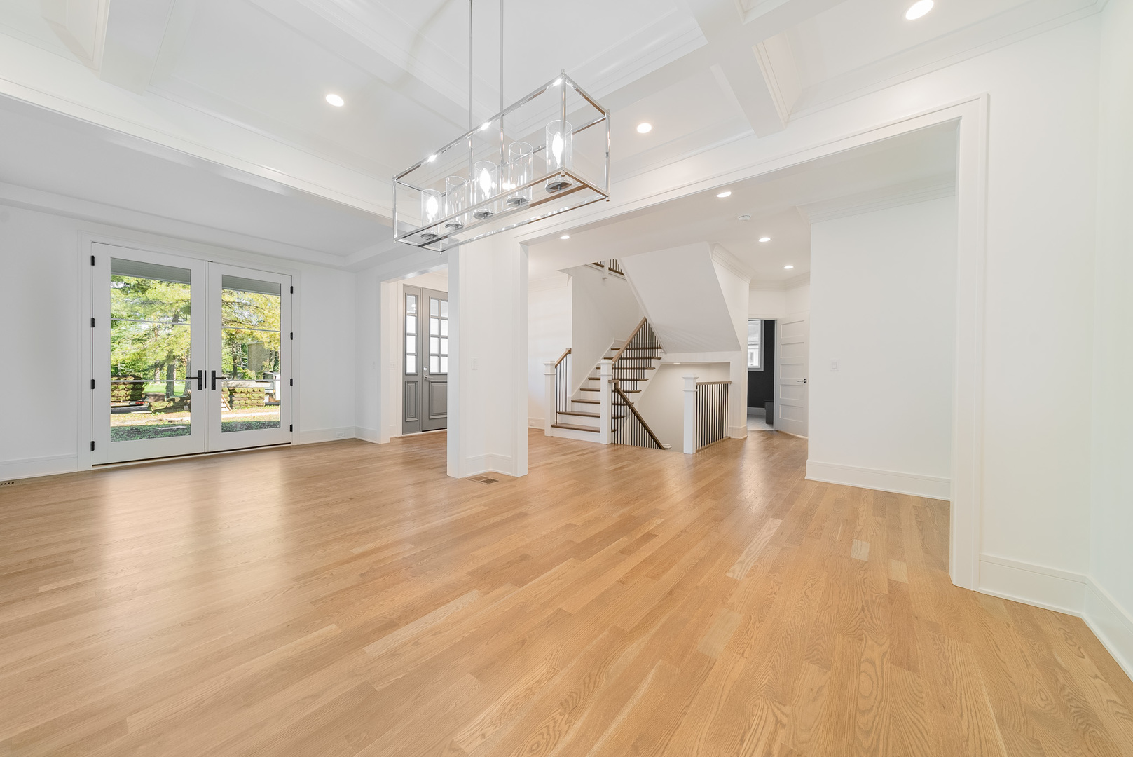 315 Walnut Street Elmhurst, IL 60126 - Photo 4 of 39 a view of an empty room with wooden floor and a window
