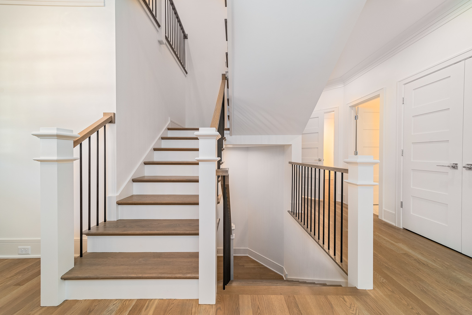 315 Walnut Street Elmhurst, IL 60126 - Photo 5 of 39 a view of staircase with wooden floor and white walls