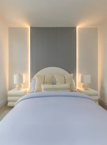 a view of entryway and hall with a couch