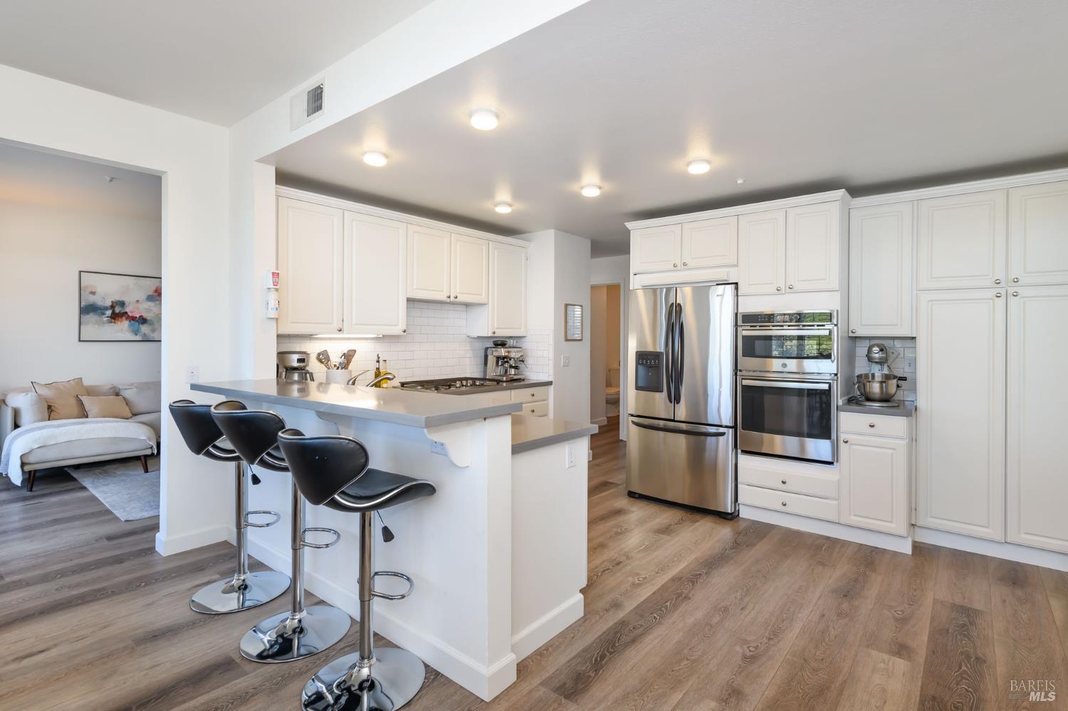13 Laurel Glen Terrace San Rafael, CA 94903 - Photo 6 of 26 Bright and light kitchen with bar, and breakfst area.