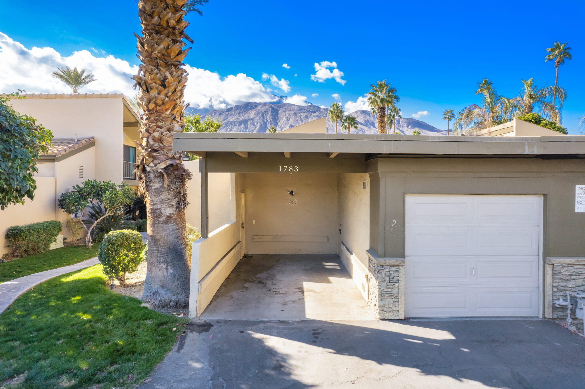 1783 Ramon Road, Unit 2 Palm Springs, CA 92264 - Photo 15 of 18 a view of a room with a tree