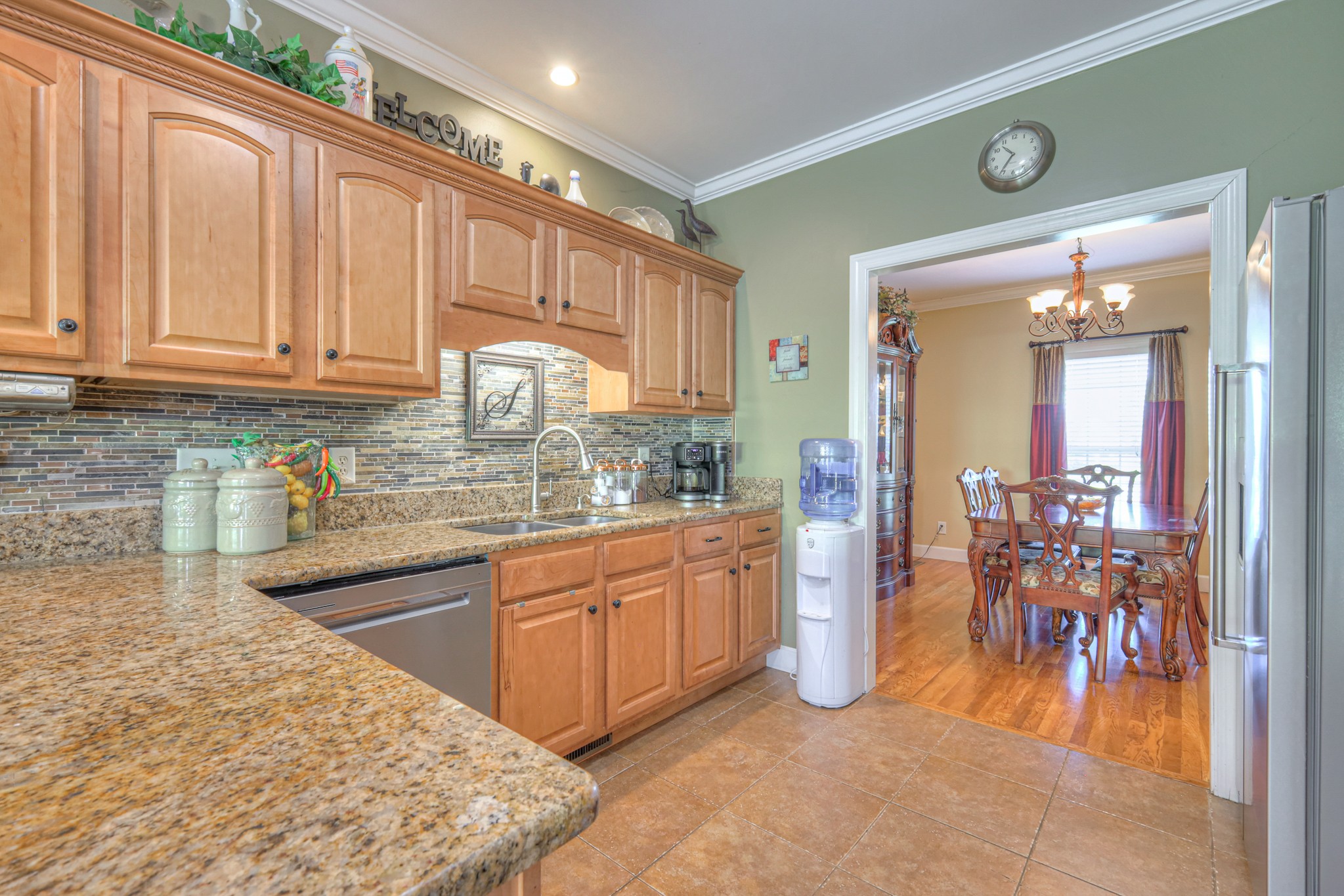 431 Conquest Road Murfreesboro, TN 37128 - Photo 15 of 55 a kitchen with stainless steel appliances granite countertop a refrigerator and a sink