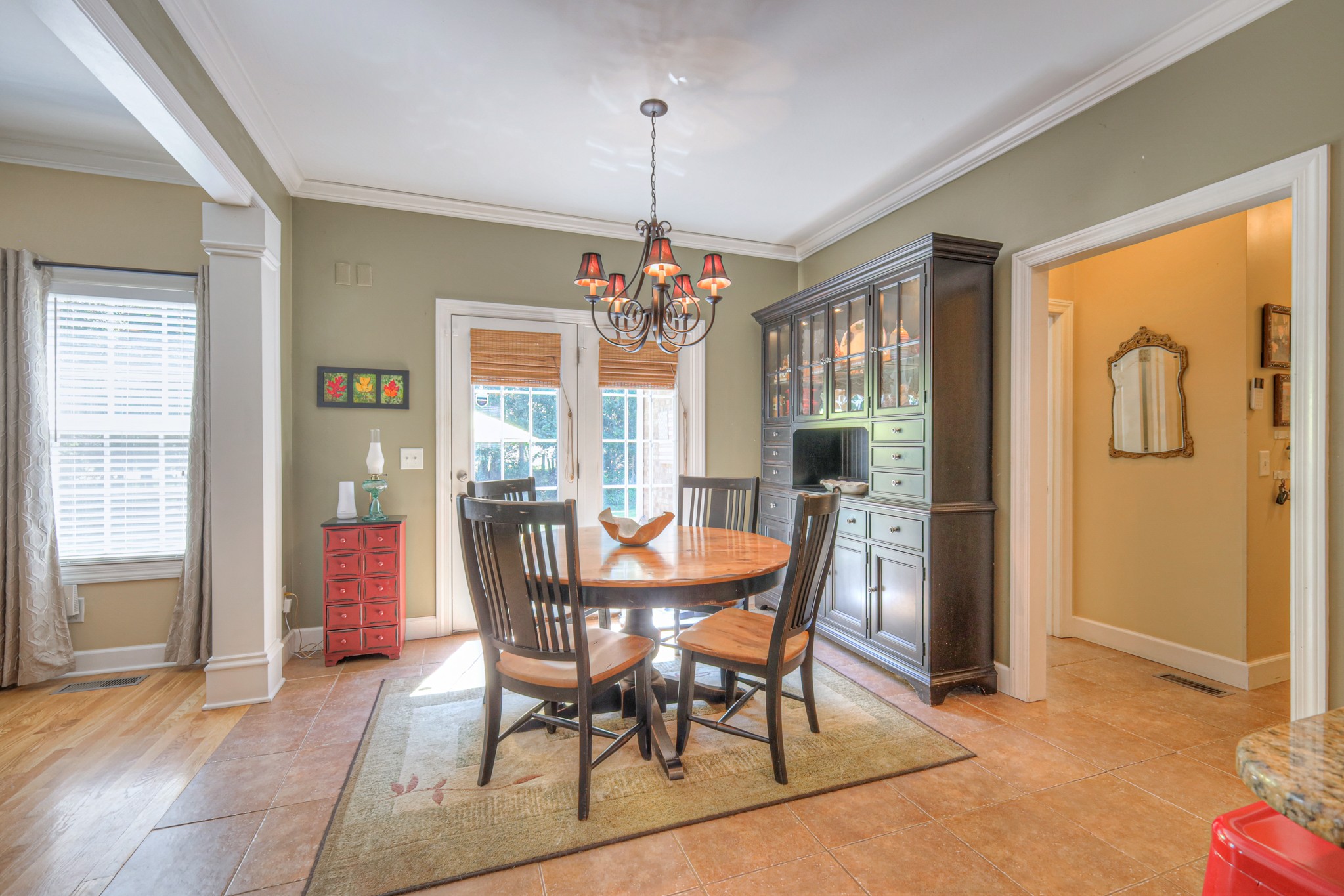 431 Conquest Road Murfreesboro, TN 37128 - Photo 18 of 55 a dining room with furniture a chandelier and window