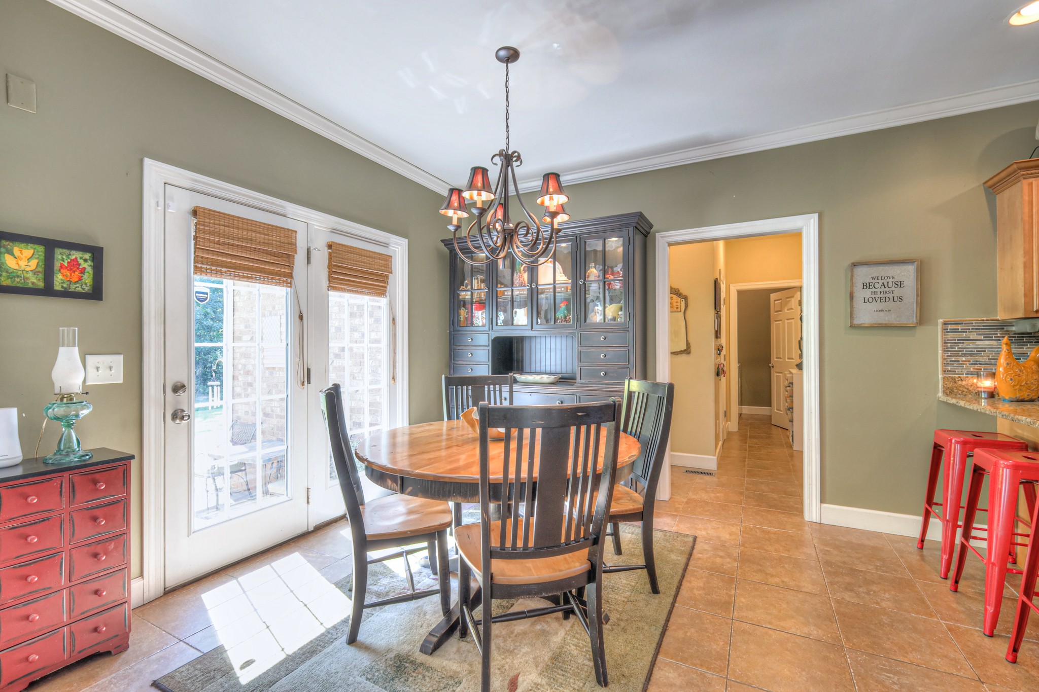 431 Conquest Road Murfreesboro, TN 37128 - Photo 19 of 55 a view of a dining room with furniture wooden floor and a chandelier