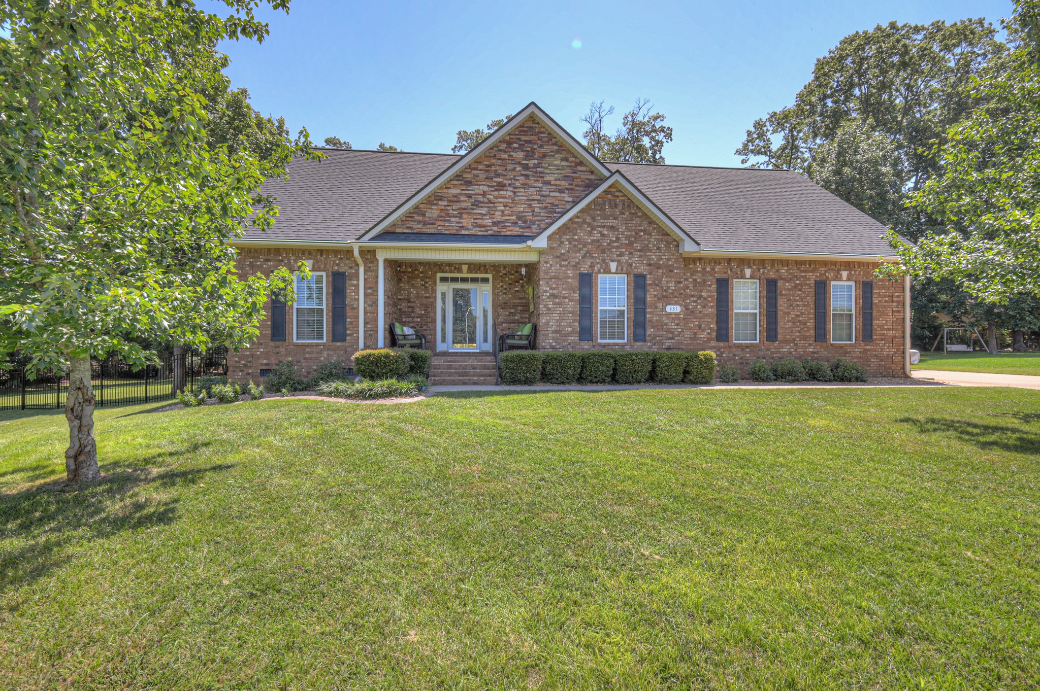 431 Conquest Road Murfreesboro, TN 37128 - Photo 2 of 55 a front view of a house with garden
