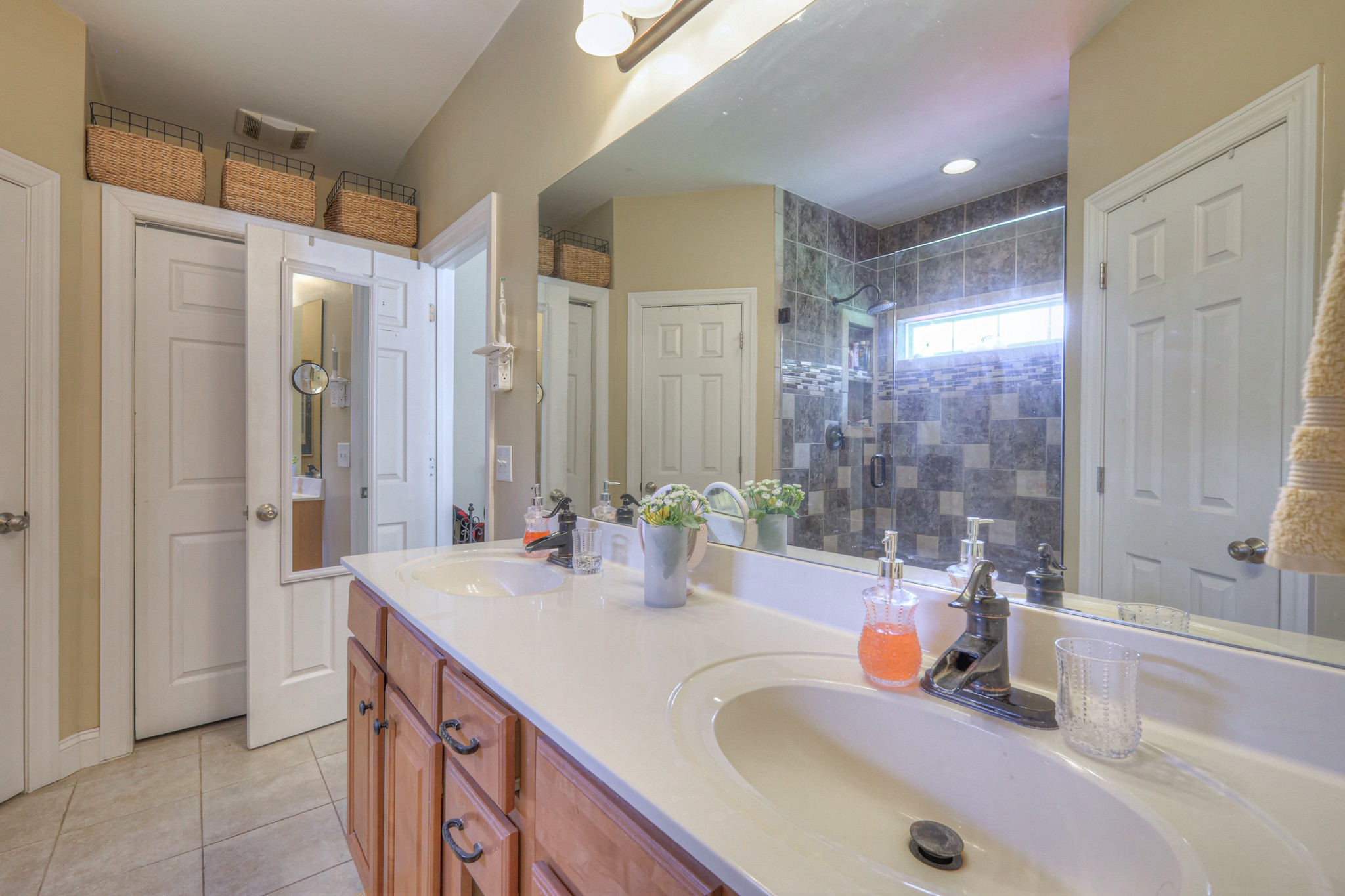 431 Conquest Road Murfreesboro, TN 37128 - Photo 29 of 55 a bathroom with double vanity sinks and a shower