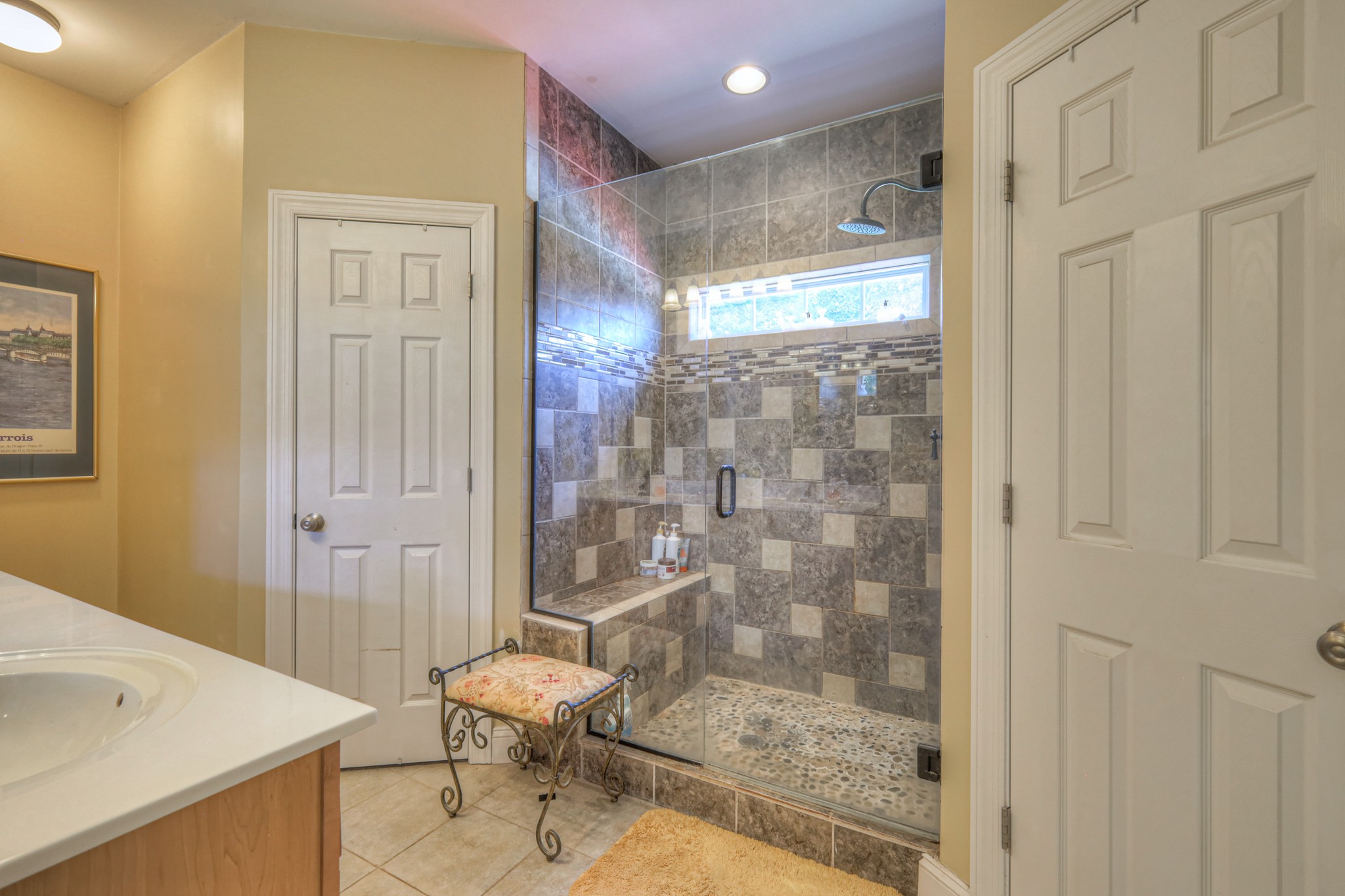 431 Conquest Road Murfreesboro, TN 37128 - Photo 31 of 55 a bathroom with a glass shower door
